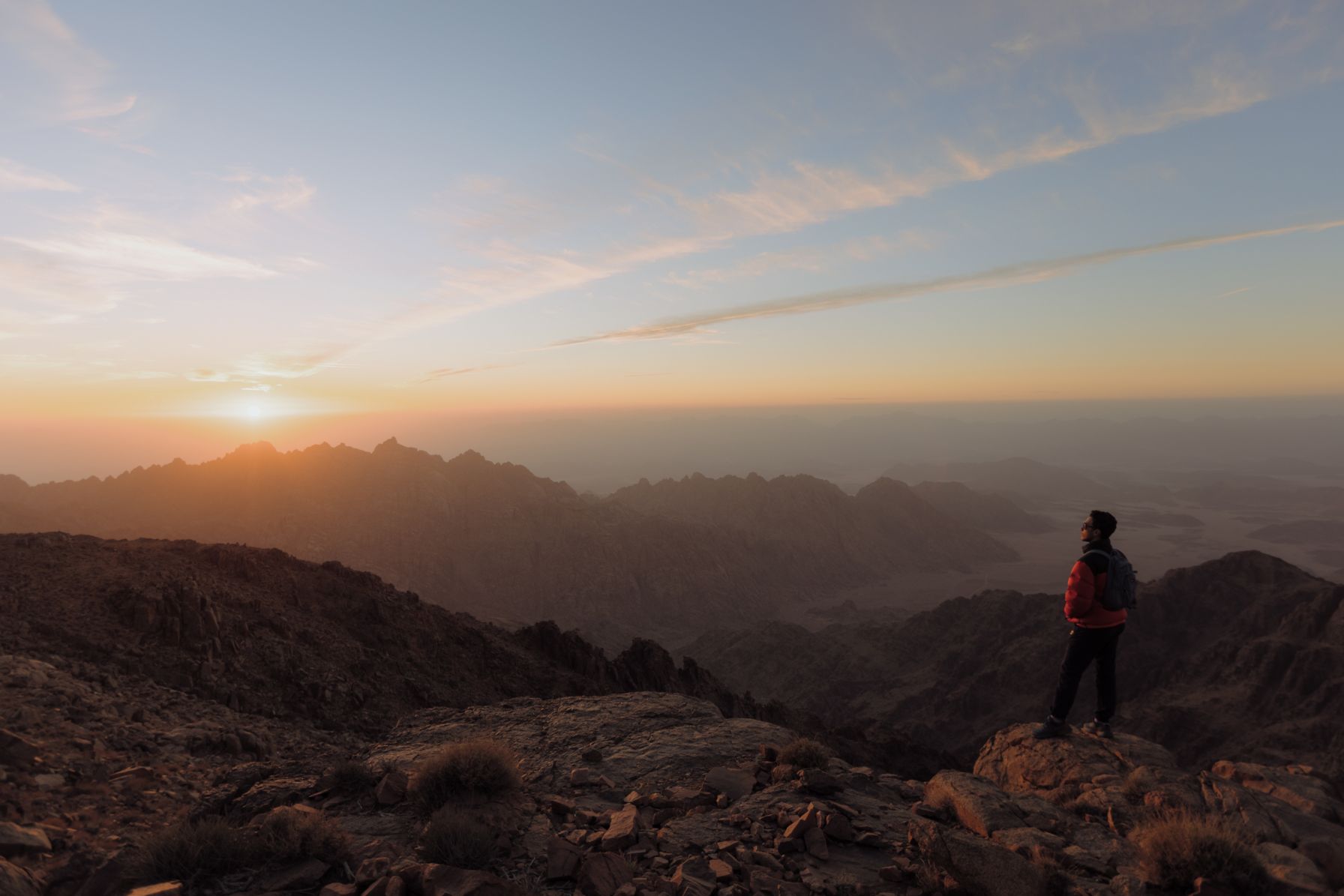 NEOM, SAUDI ARABIA – DECEMBER 13: Ibrahim explores the summit of Jebel al Lawz at the Mountains of Trojena December 13, 2022, in NEOM, Saudi Arabia.