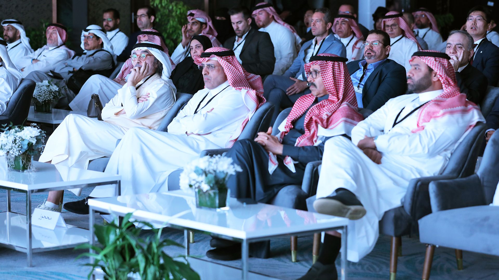 The top management of NEOM participating in a conference