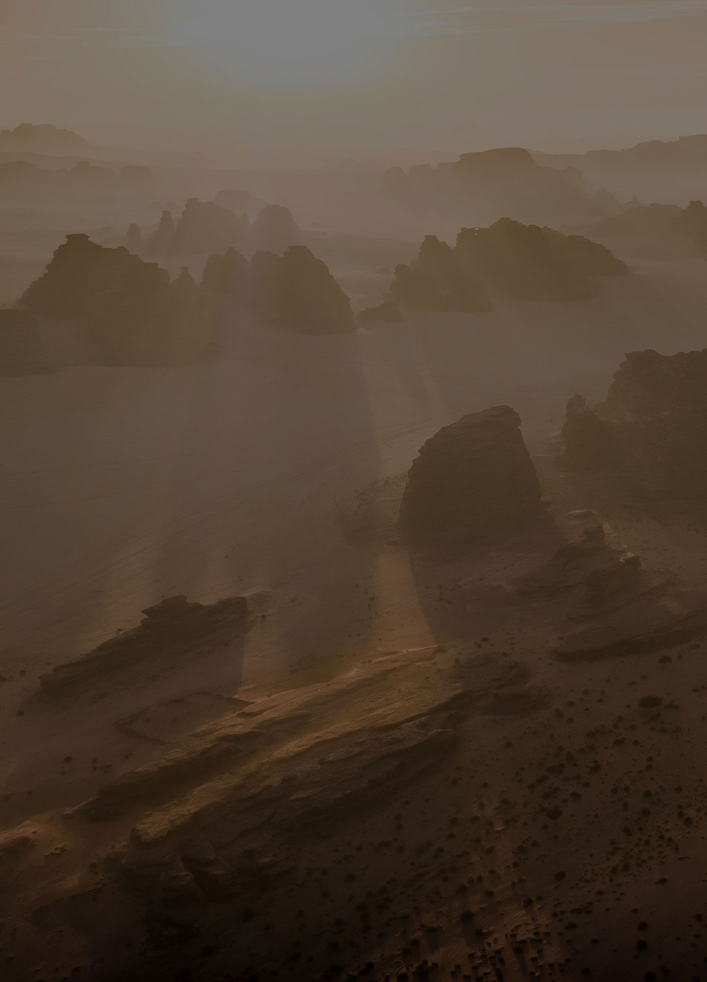 Vue aérienne des montagnes de NEOM avec la lumière du soleil qui traverse les sommets escarpés